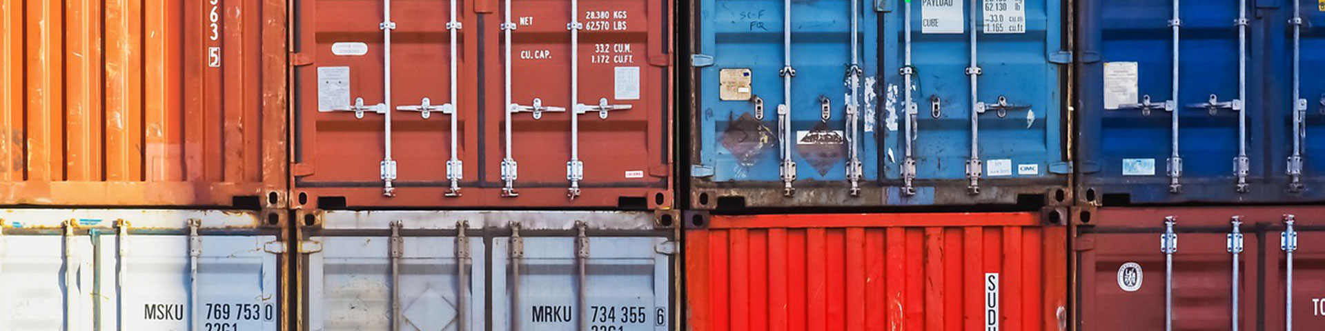 Several shipping containers in different colours.