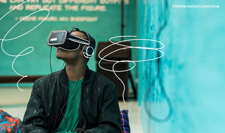 A man wears virtual reality glasses. Copyright: Goethe Institute/Lamek Orina