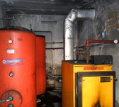 Energy-efficiency measures in the building sector. Inspection of a heating system and boiler. © GIZ
