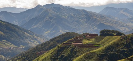 A panorama of verdant mountains.