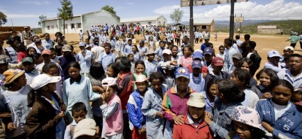 A large group of people in a village environment
