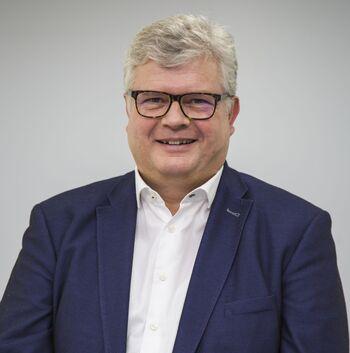 A portrait photo of Mr Lange