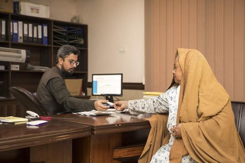 A woman and a man in an office