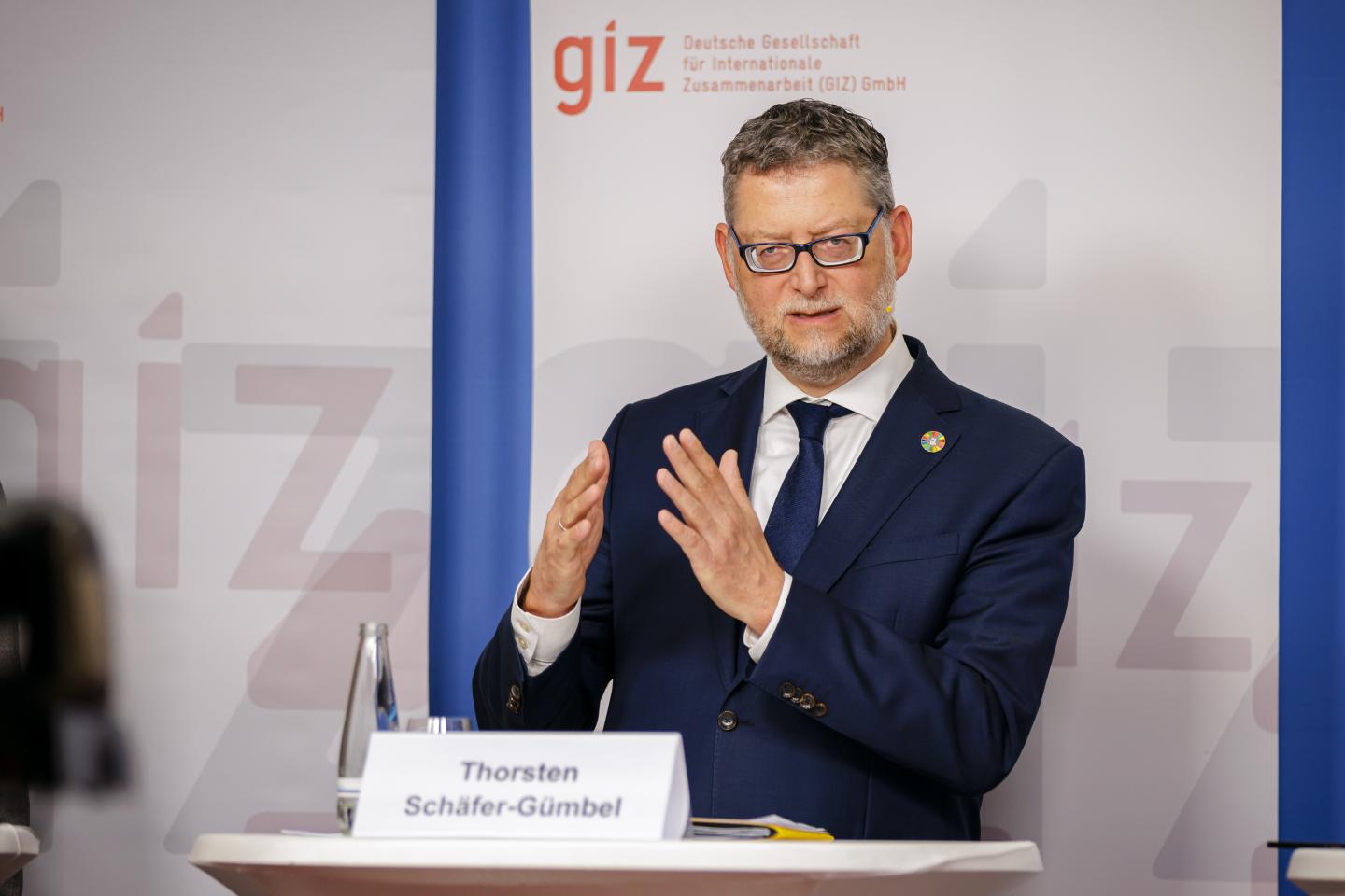 GIZ Vorstandssprecher Schäfer-Gümbel präsentiert die Jahresbilanz der GIZ.