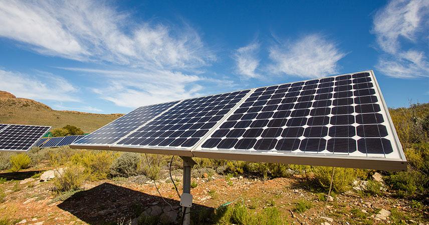 Solar panels with blue sky in the background