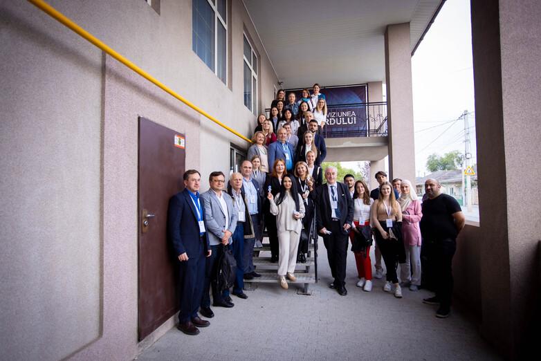 Project participants stand together for a photo.
