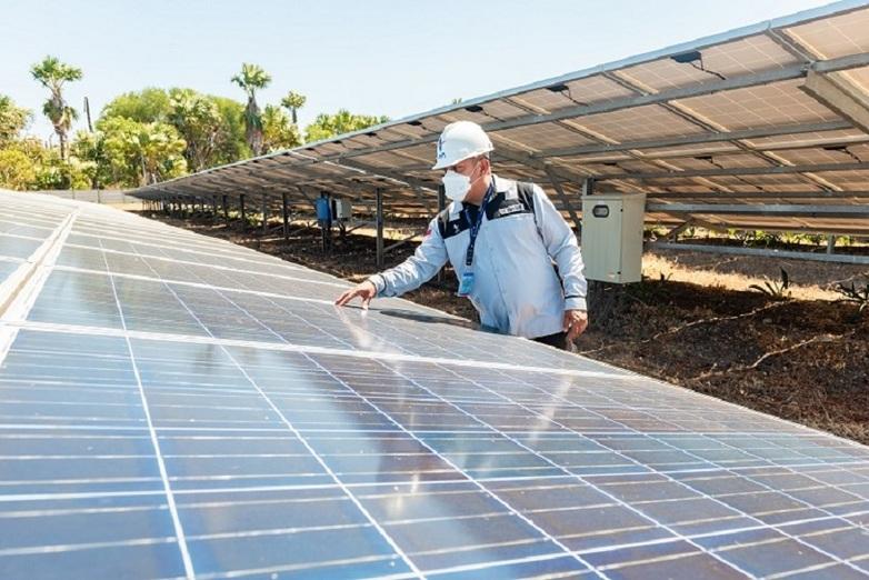 A technician checking a solar PV installation at PT Len Industri (Persero) ©GIZ Indonesia, 2021