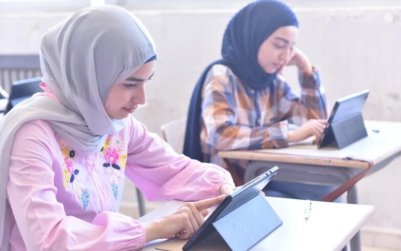 TVET students utilise computer tablets to navigate through developed e-lessons in Health Inspection and Food Safety.