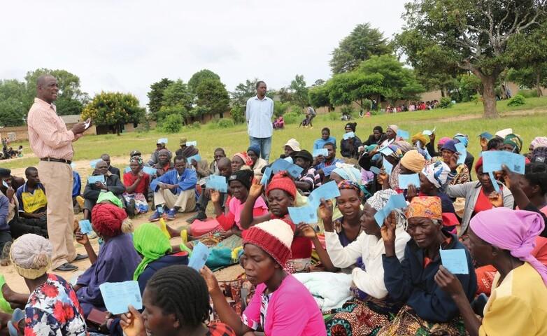 UBR data validation: Council official validating names of community members through their UBR blue cards