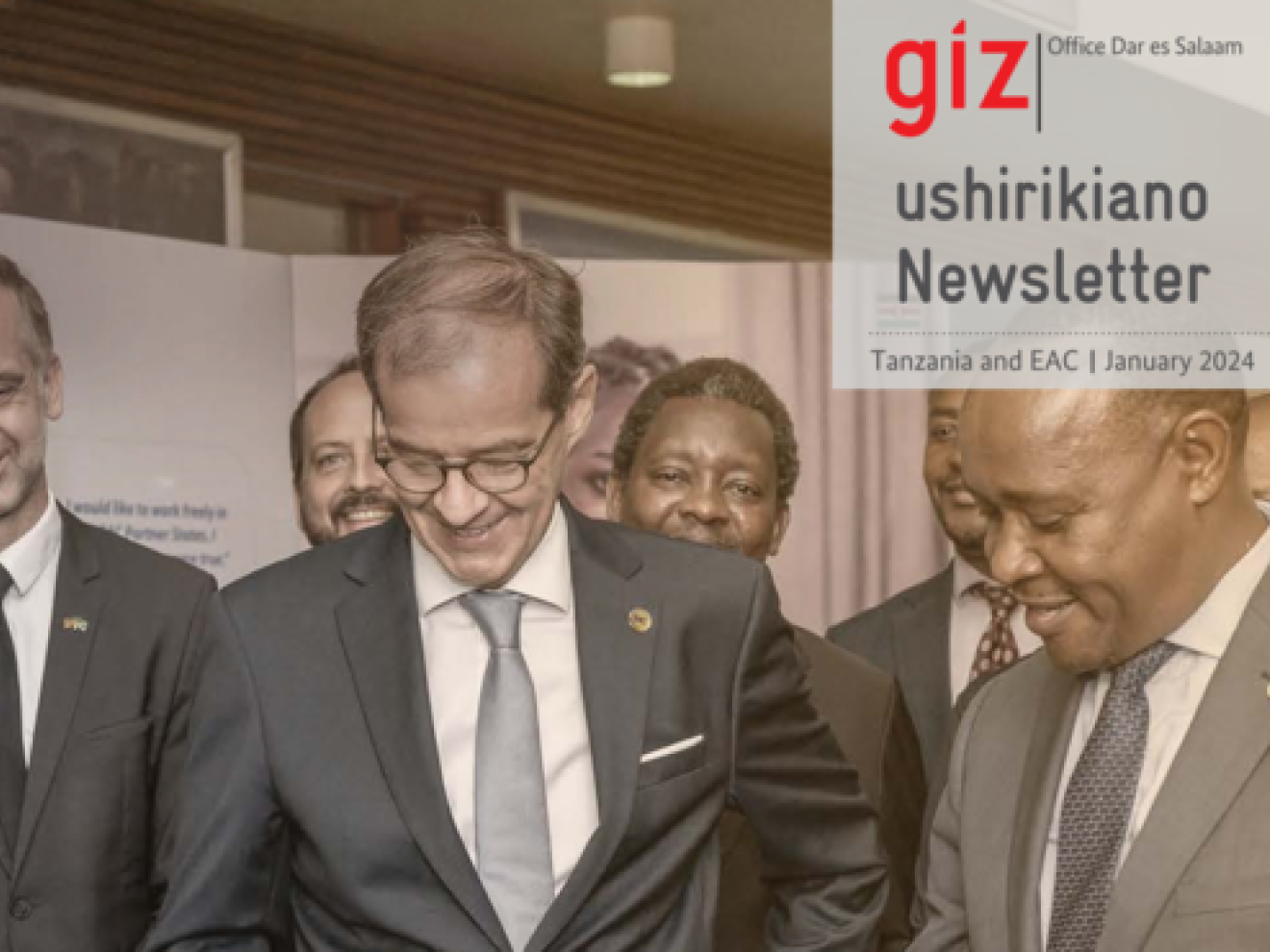 Group of men smiling