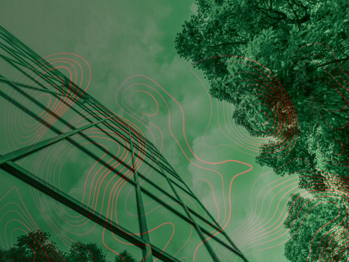 Photographed from below, a glas facade and a tree, the picture has a green filter on it.