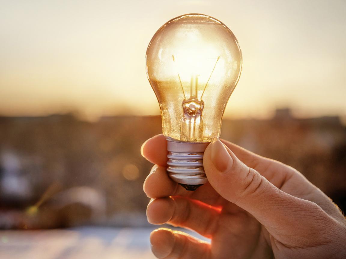 Light bulb through which the evening sun shines.