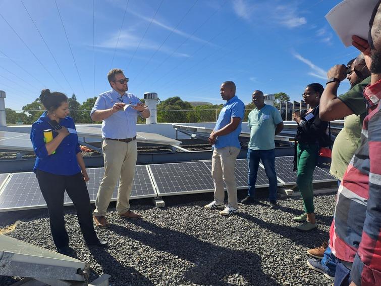 People listening to a man talking
