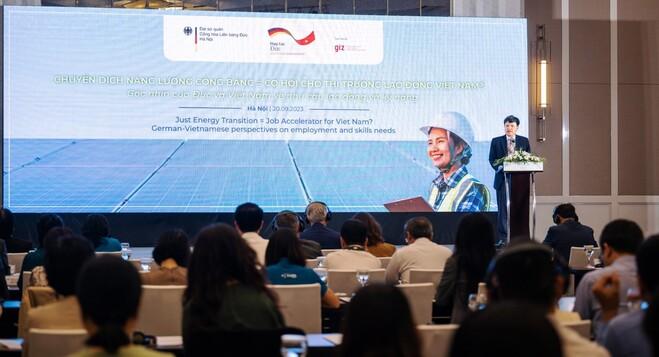 Man doing a presentation in front of a group of people