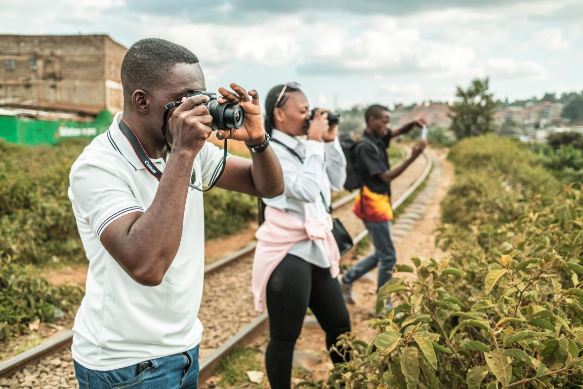 Emerging photographers capturing community experiences of resilience during the field assignment in Kibera, Nairobi 