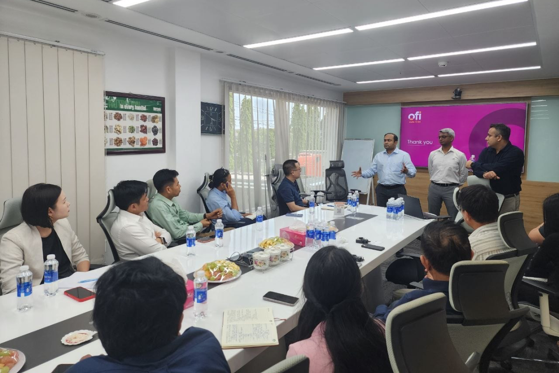 A group of people is taking part in an event lead by employees of Olam Food Ingredients.
