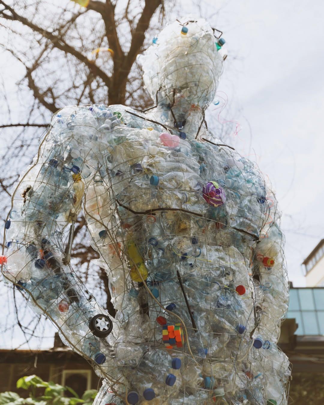 Captain Green, superhero made up of recycled and repurposed materials 