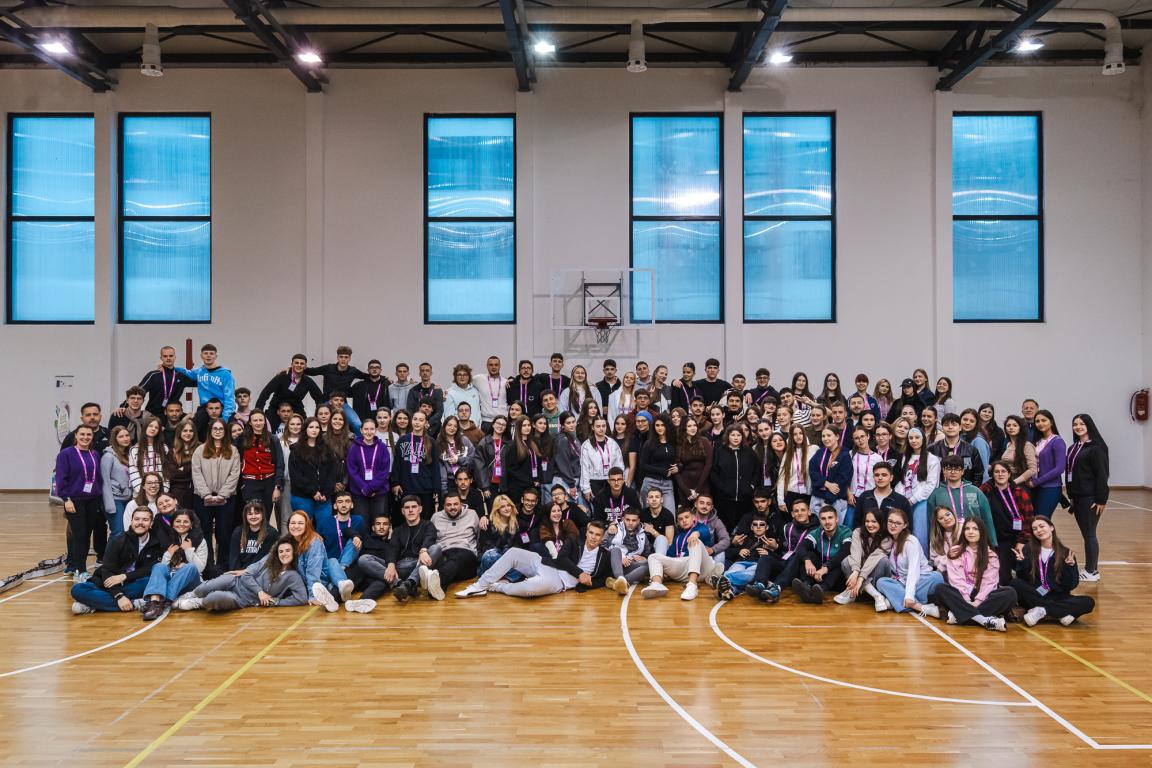 A large group of Superschools participants posing together during the Youth Camp in Zlatibor, Serbia.