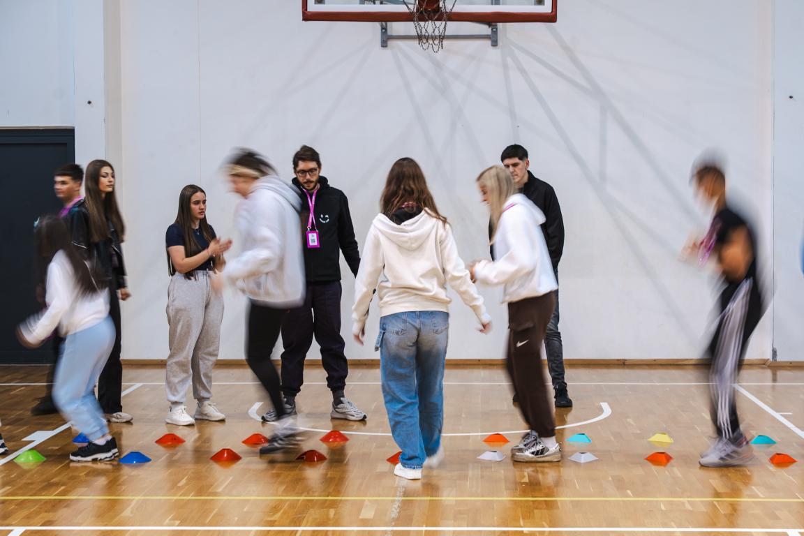 Young participants taking part in teamwork activity during the Superschools Youth Camp in Zlatibor, Serbia.