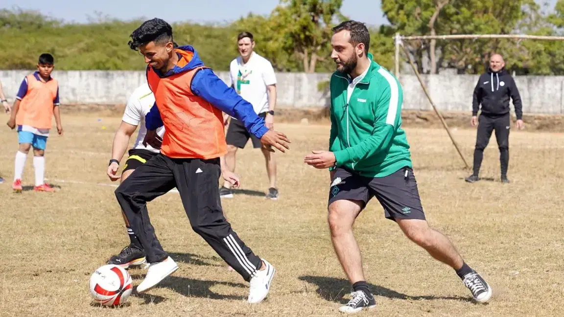 A few people playing football