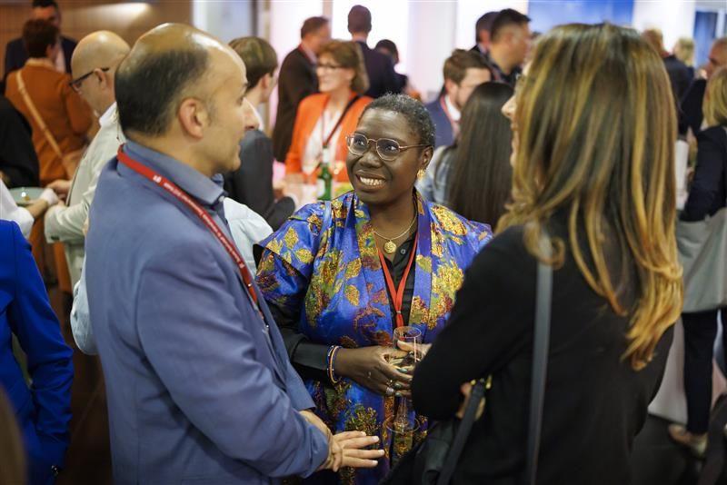 Three people talking to each other