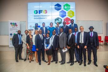 A group of people pose for a photo at the opening of the programme.