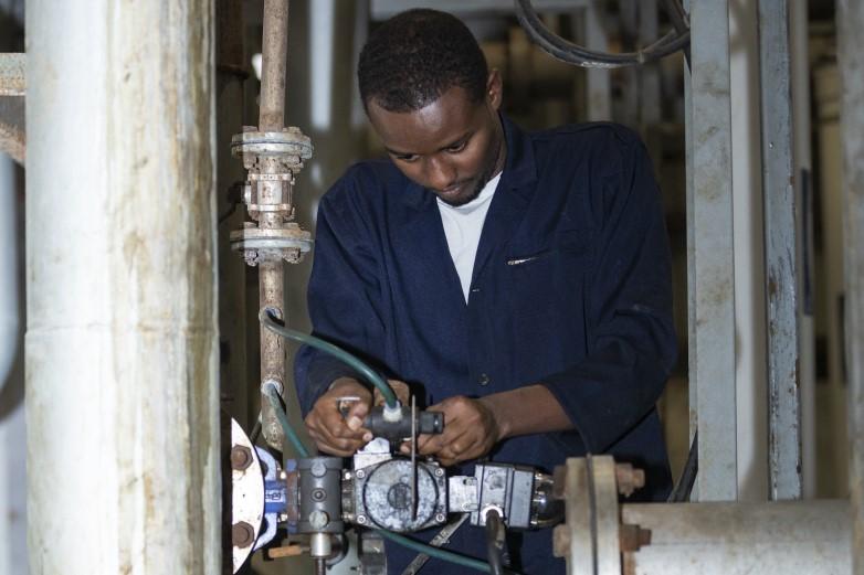 A male industrial mechanic trainee at work in the Hawassa industrial park.