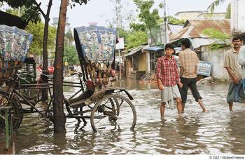 During the monsoon in Dhaka, Bangladesh, the sewers cannot cope with all the rainwater.