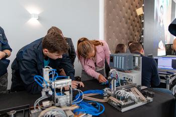 A man and a woman at a mechatronics training