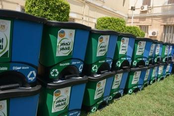 Waste containers stacked in rows of two.