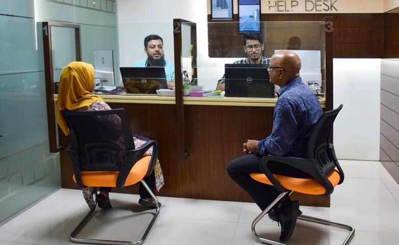 Two people at the national solar help desk receive support for establishing net metered rooftop solar systems on their premise.