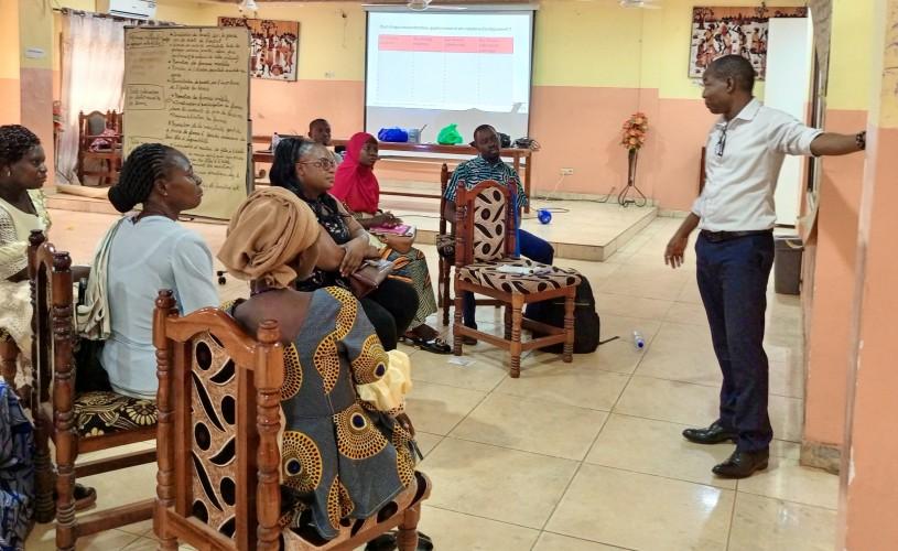Members of the community of Kaya in Burkina Faso participate in an awareness raising activity on gender equality.