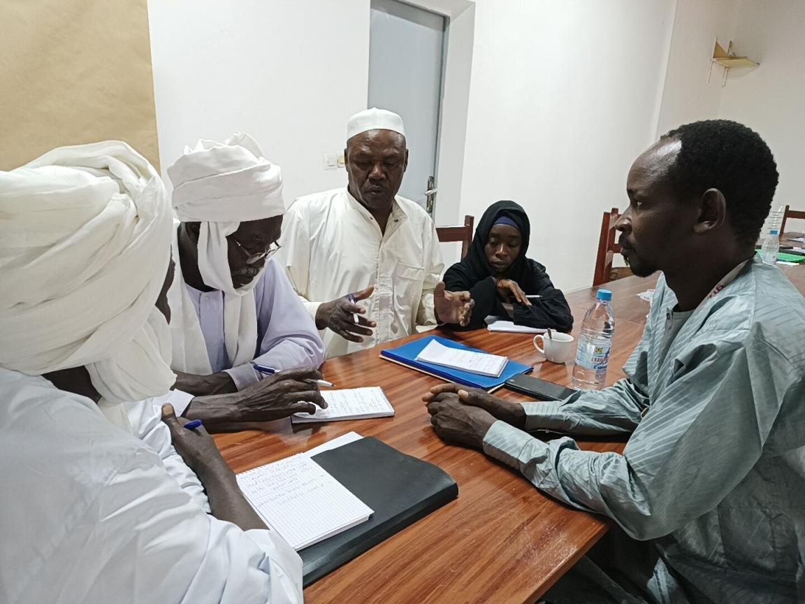 Local figures of authority and representatives of local conflict resolution bodies sitting together during a conflict training course in Sudan.