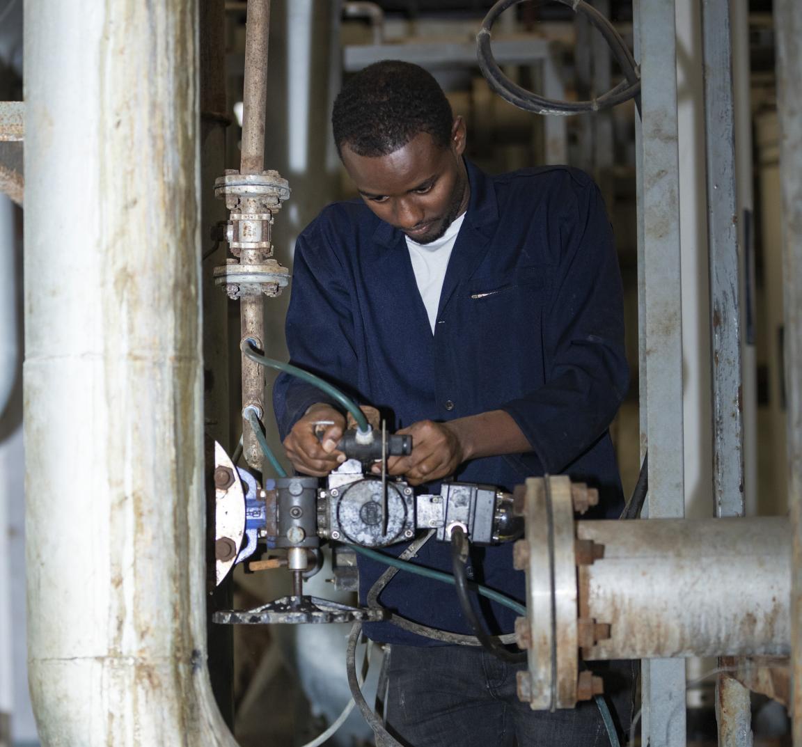 A male industrial mechanic trainee at work in the Hawassa industrial park. 