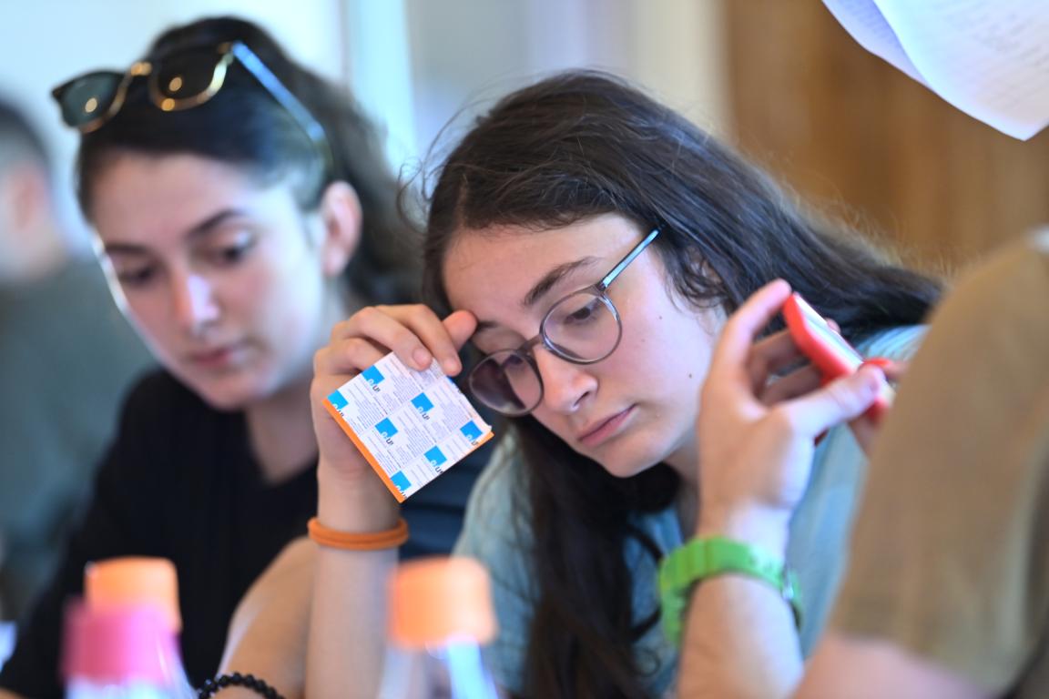 Young women learning at a summer camp.
