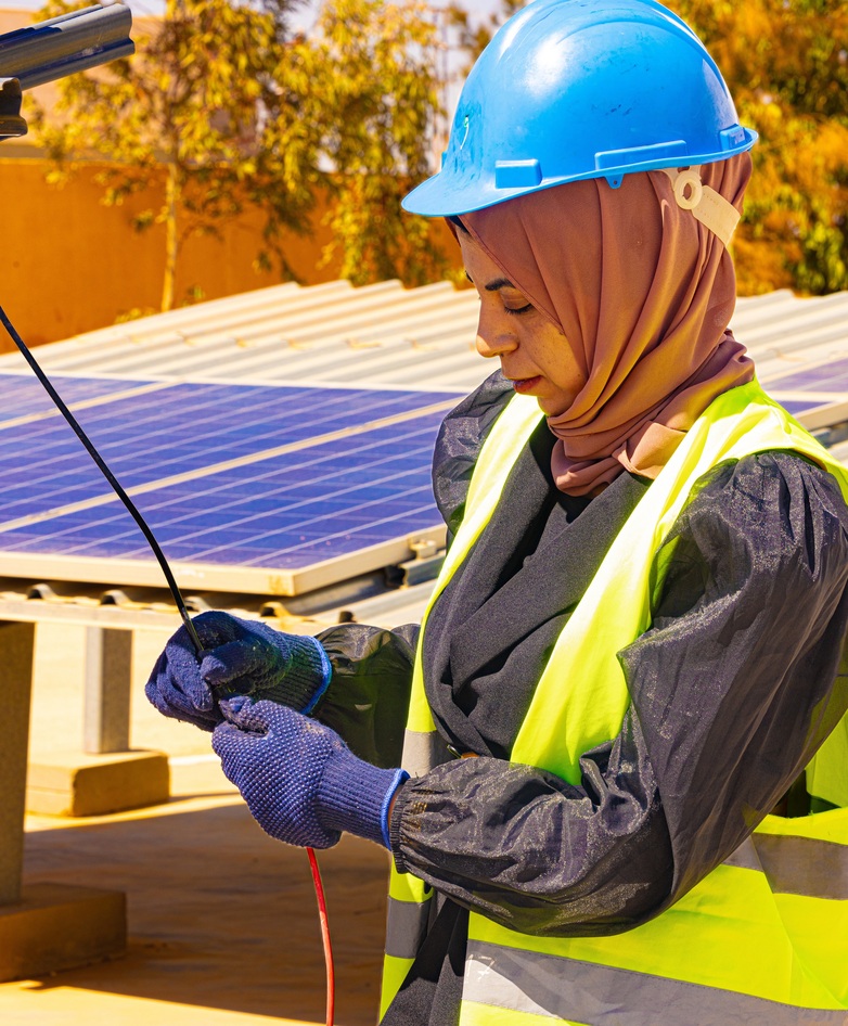 A trainee taking part in training on photovoltaic systems.