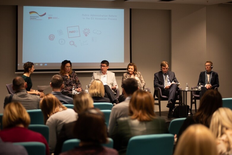 Participants in a panel discussion.