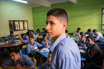 Students sit in the classroom and receive career guidance at the Abasseya Industrial Boys School in Cairo. 