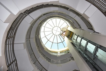 A round glass roof in an office building