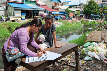 IDPoor household interview in a slum area of Phnom Penh.