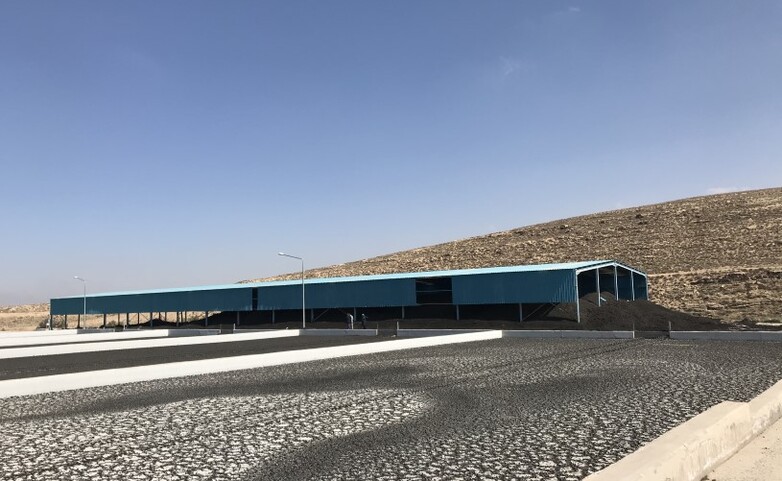 Sludge-drying beds and stockpiling at Muta Mazar wastewater treatment plant.