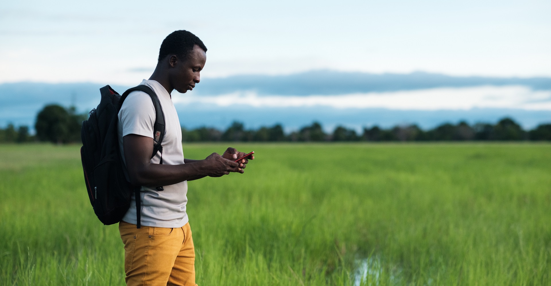 Nigerian farmer at work on the rice field 