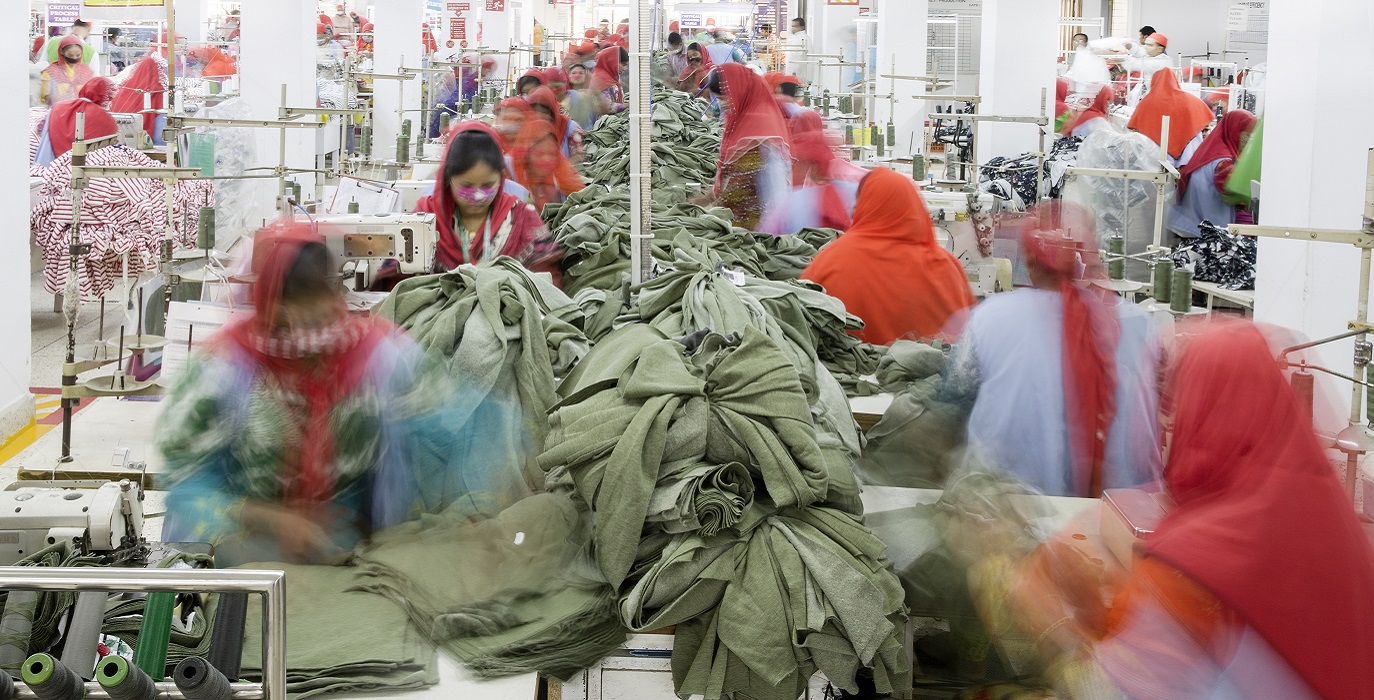 A group of people working in a factory.